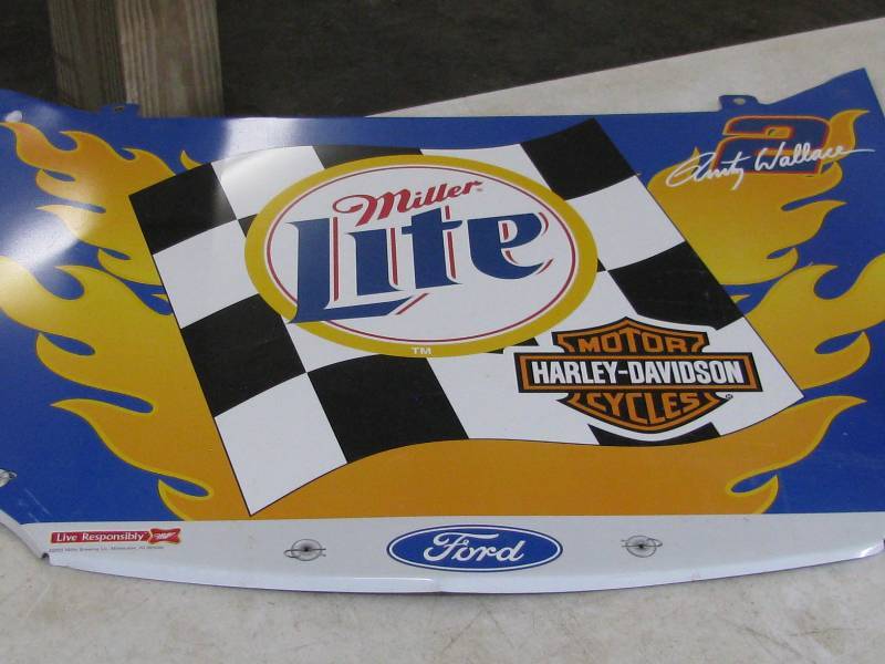 lot 38 image: Miller Lite Metal Sign