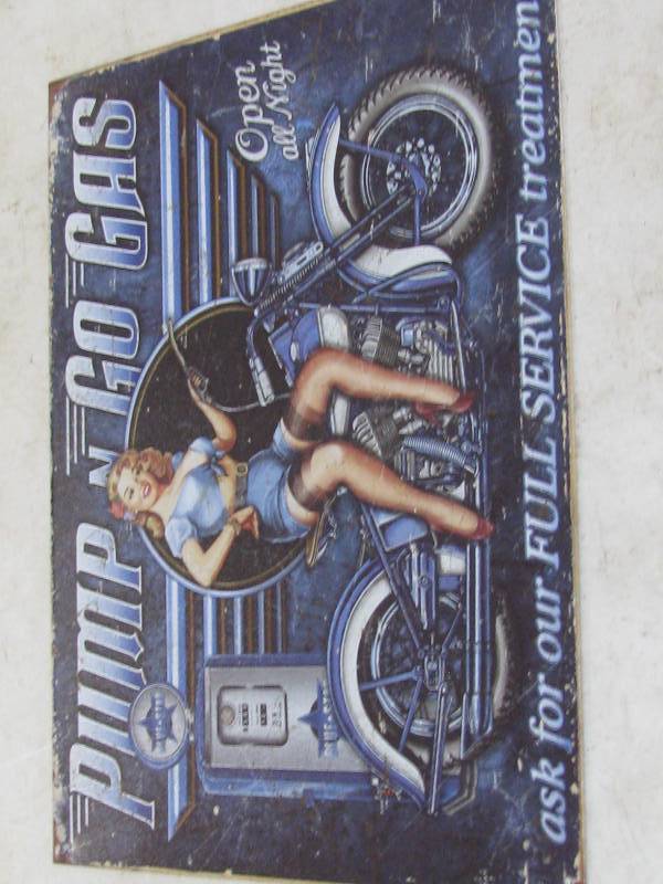 lot 43 image: Pump Gas Motorcycle Sign