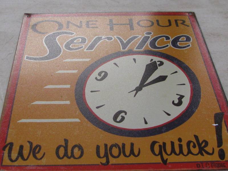 lot 50 image: One Hour Service Sign