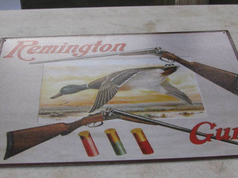 lot 66 image: Remington Guns Sign