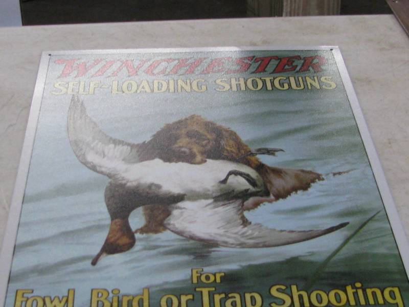 lot 71 image: Winchester Shotguns Sign