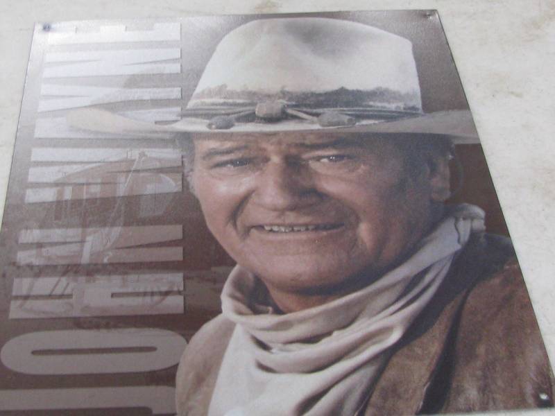 lot 75 image: John Wayne sign