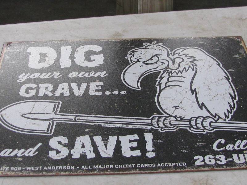 lot 76 image: Dig Your Grave Sign