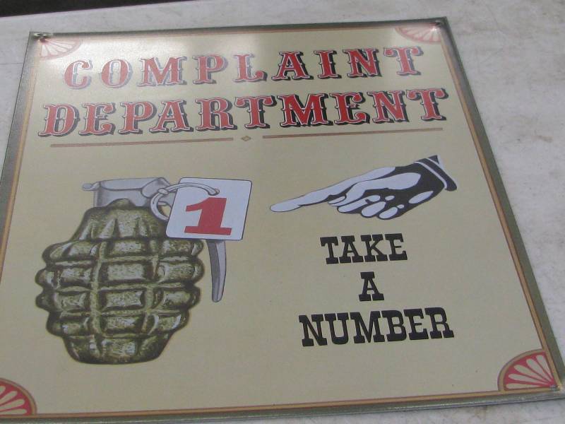 lot 91 image: Complaint Department Sign