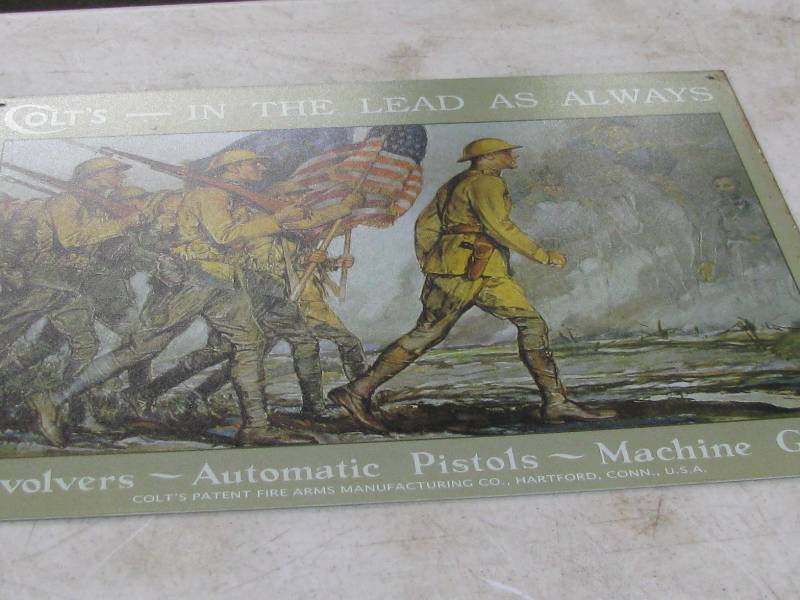 lot 103 image: Colt Revolvers Sign