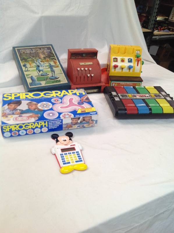 lot 91 image: Games - Feudal, Spirograph, two cash Registers, Super Simon and Micky Mouse Calculator