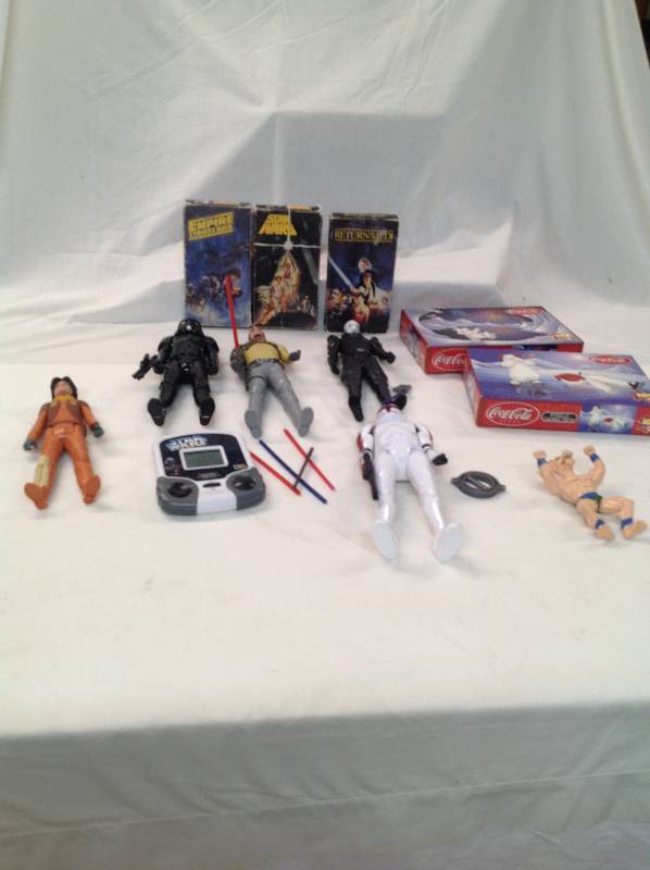 lot 93 image: Star Wars VHS Tapes, CocaCola Puzzles