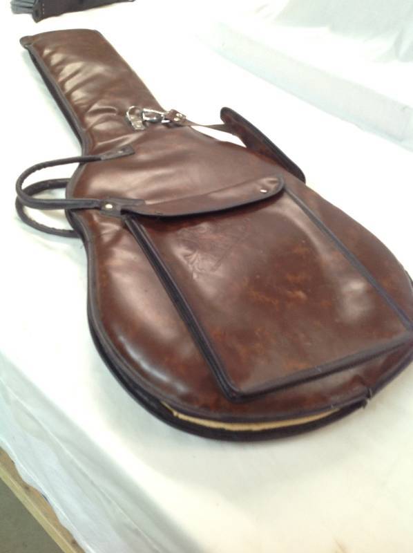 lot 96 image: Leather Guitar Case - With Handles and Shoulder Strap