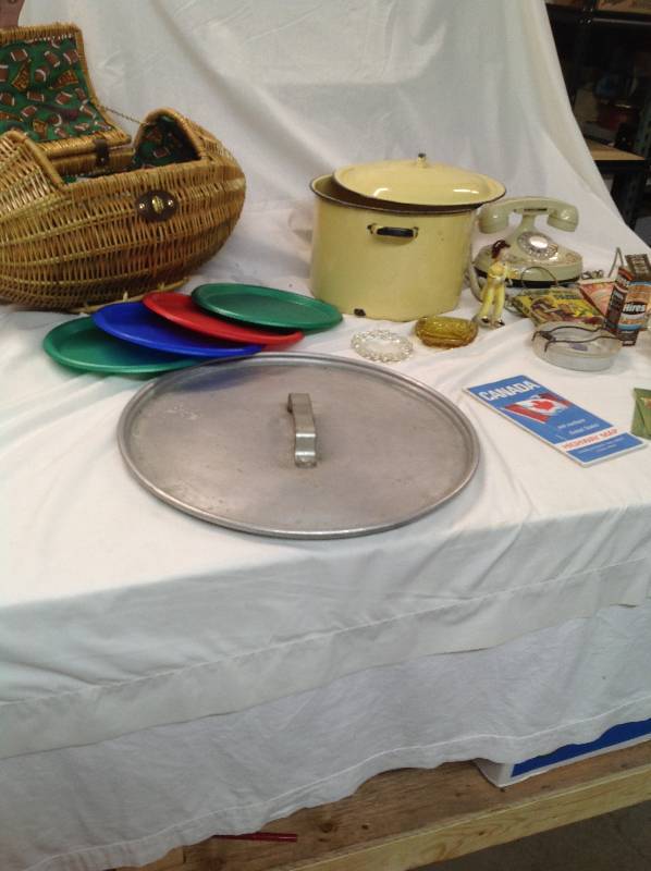 lot 99 image: Football Picnic Basket, Pot, Giant Lid, Old Phone, and Misc house hold items
