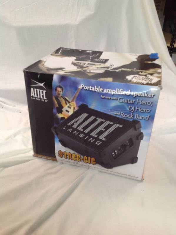 lot 103 image: New - Portable Amplified Speaker for Guitar Hero, Dj Hero and Rock Band