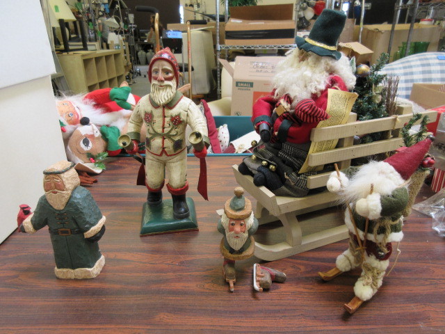 lot 305 image: LIMITED EDITION WOOD SCULPTURES AND SANTA ON SLEIGH AND SKIS
