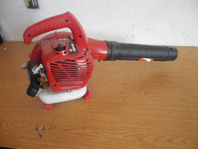 lot 7 image: Homelite 150 MPH 400 CFM 2-Cycle Handheld Gas Leaf Blower