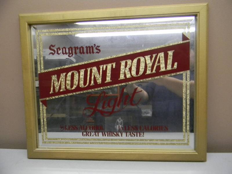 lot 10 image: VINTAGE SEAGRAMS MOUNT ROYAL LIGHT WHISKY BAR SIGNMIRROR HEAVY PIECE - RARE - APPROX 22 BY 19 - SEE PICTURES