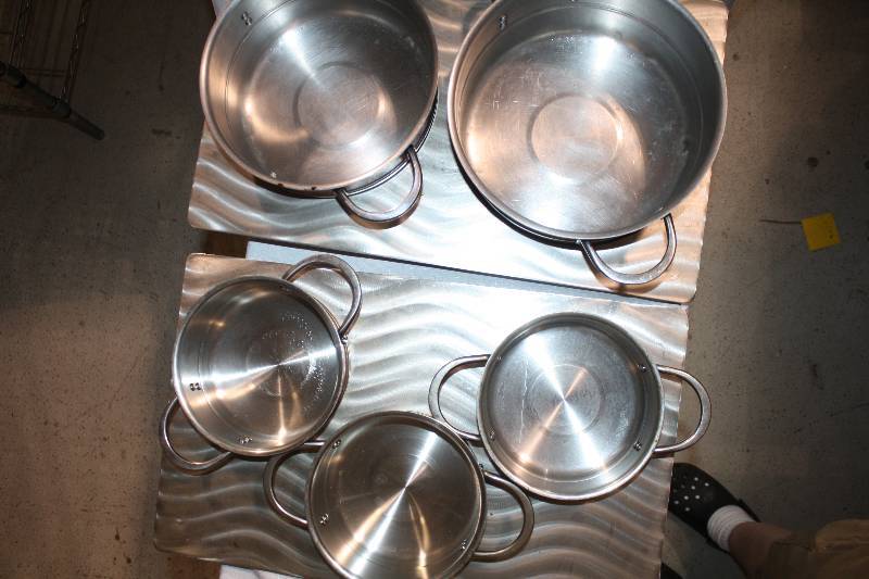 lot 129 image: Pots and metal plates