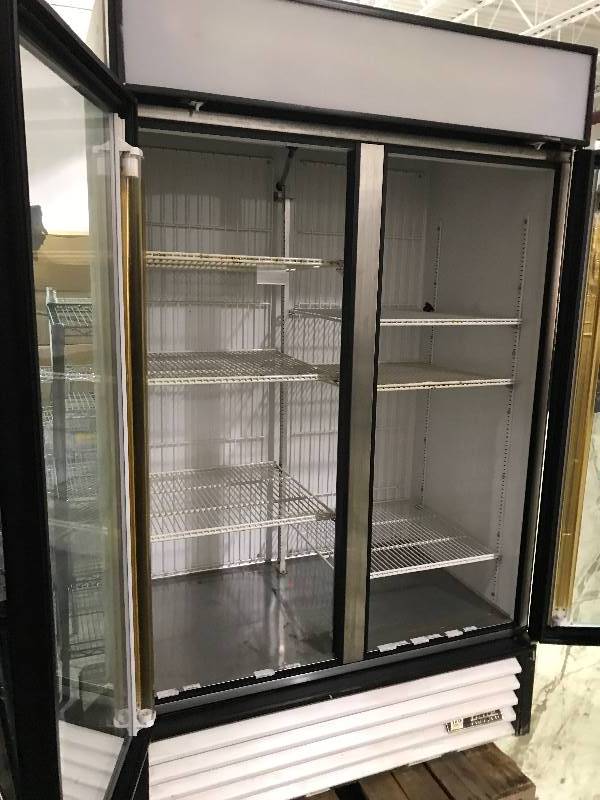 lot 3 image: True, Mod #GDM-49F, two glass door commercial freezer, NSF, 208230 volts, 12.3 amps, 1 ph Runs Freezes