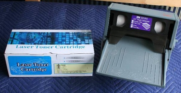 lot 78 image: Printer Toner Cartridge and Two-Sided Laminator