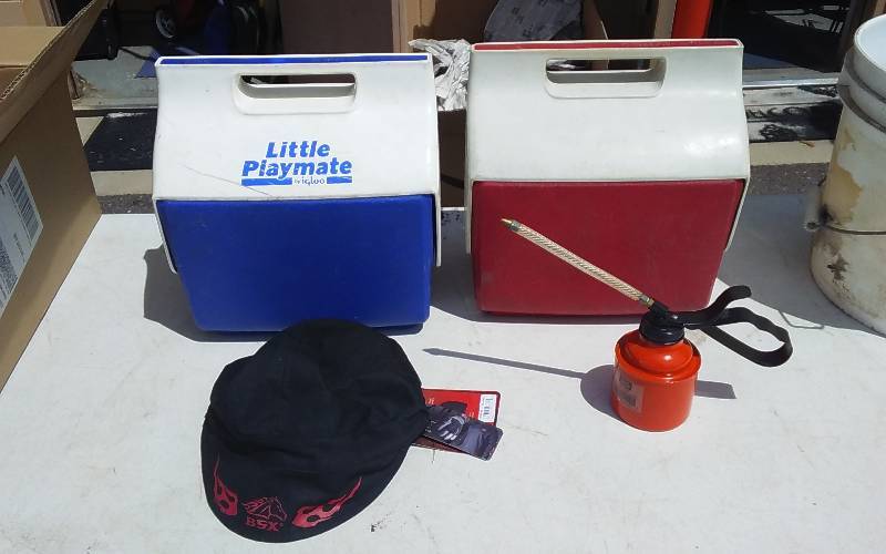 lot 32 image: 2-Igloo Little Playmate Coolers, 1-New Welding Cap, 1-Oil Can