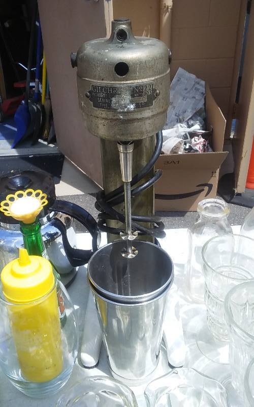 lot 33 image: Vintage Gilchrist Malt Mixer, 2-Malt Cups, Sundae Glasses, Vintage Bottles, Coffee Server, Misc.