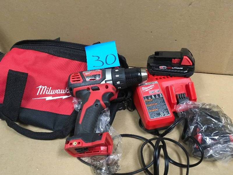 Milwaukee M18 18-Volt Lithium-Ion Cordless 12 in. Drill Driver Kit W(2) 1.5Ah Batteries, Charger in working conditions