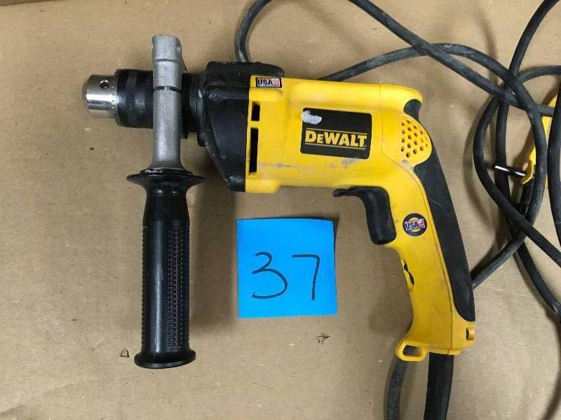 Dewalt 12 in. Variable Speed Reversible Hammer Drillin working conditions