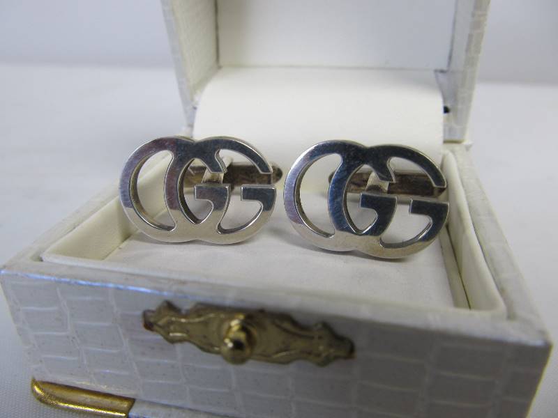 lot 6 image: Authentic Signed GUCCI Sterling Silver Double G Cufflinks