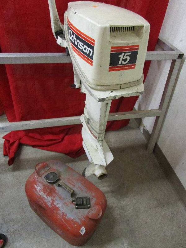 lot 10 image: Boat Motor Johnson 15M This motor runs and has been run through the marine shop, ready for the water