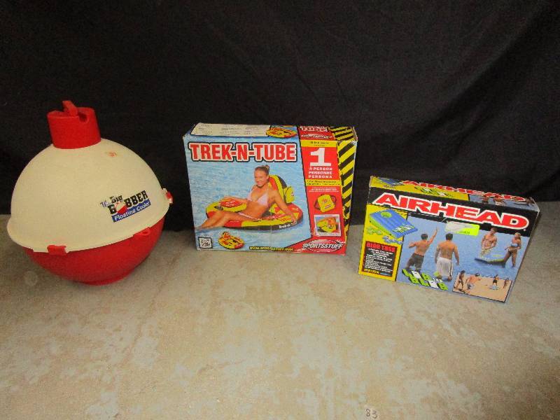 lot 24 image: Trek N Tube 1 Person Unused still in box, Bobber Cooler for your Drinks and Airhead Inflatable Toss Game