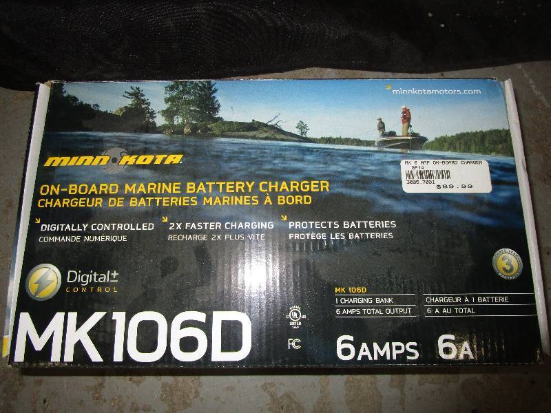 lot 26 image: Minn Kota New in the Box MK 106D 6 Amp Marine Battery Charger