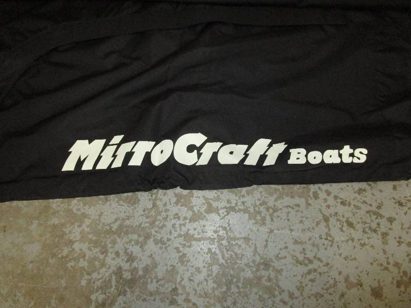 lot 76 image: Microcraft 15 Ft Boat Cover unused