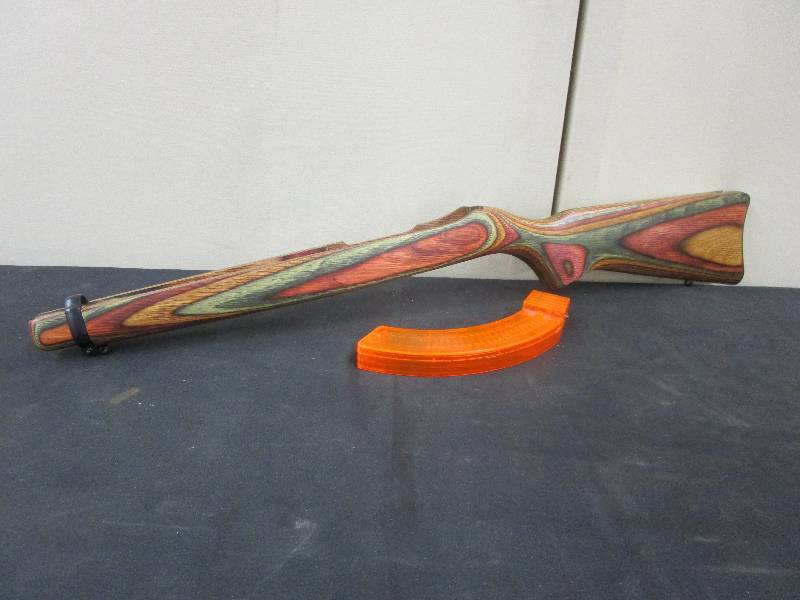 lot 6 image: RUGER 1022 WOOD STOCK AND 30 ROUND 1022 MAGAZINE