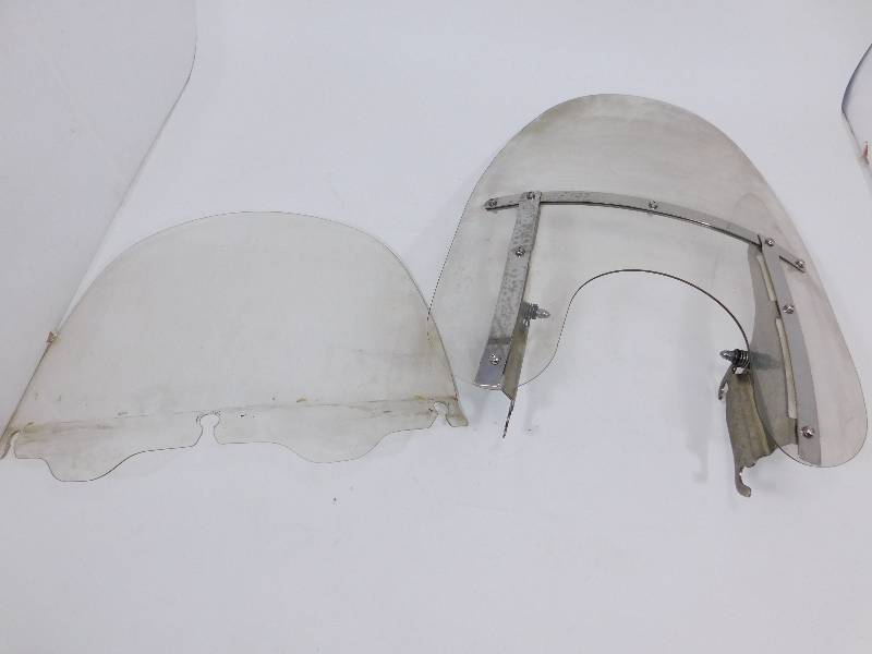 lot 46 image: Two Motorcycle Windschields