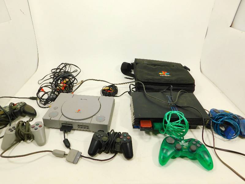 lot 88 image: Play Station 2 & Sony Play Station 1  With Controllers & A Carrying Bag