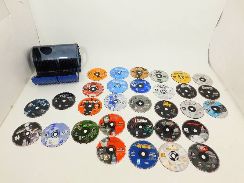 lot 96 image: Play Station 1 Games In Storage Container