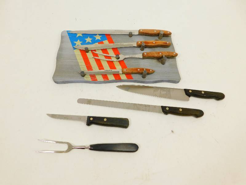 lot 112 image: Wooden Board For Displaying Knives, Etc  and Six Knives and Two Serving Forks