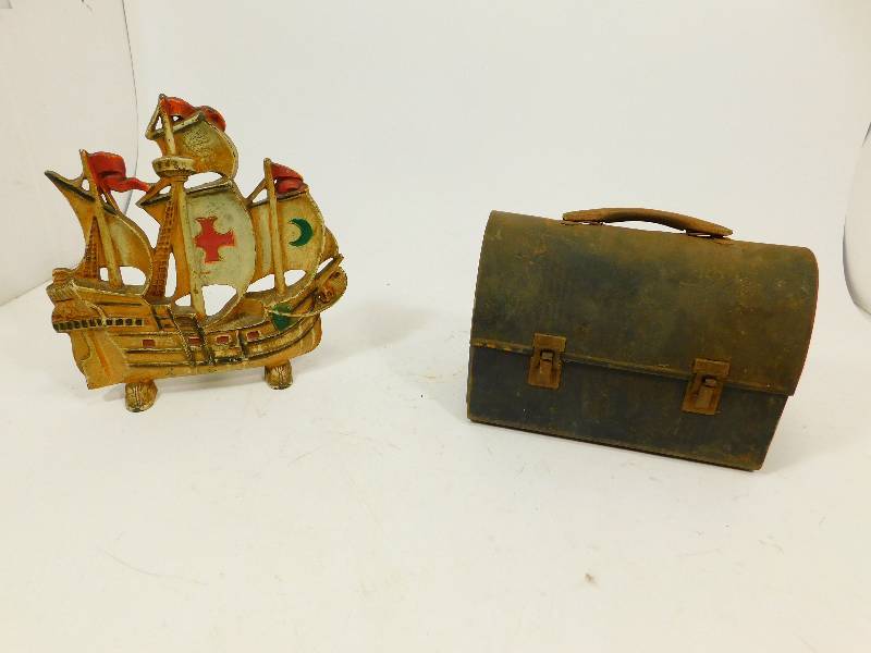 lot 118 image: Black Antique Lunch Pail & A Pint Thermos Bottle  & A Vintage Cast Iron Ship Door Stop