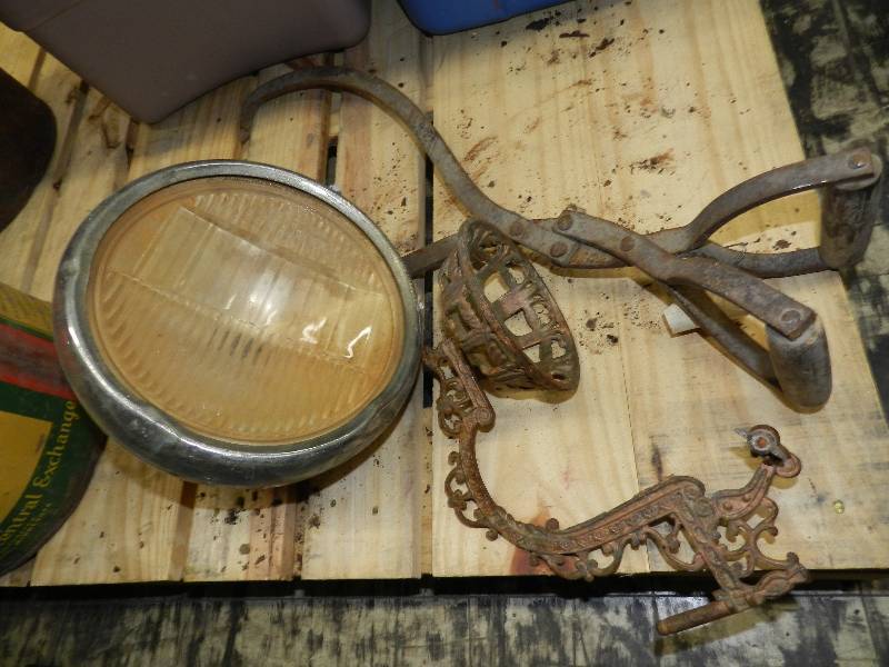 lot 566 image: LAMP BRACKET, ICE TONGS AND OLD HEAD LIGHT