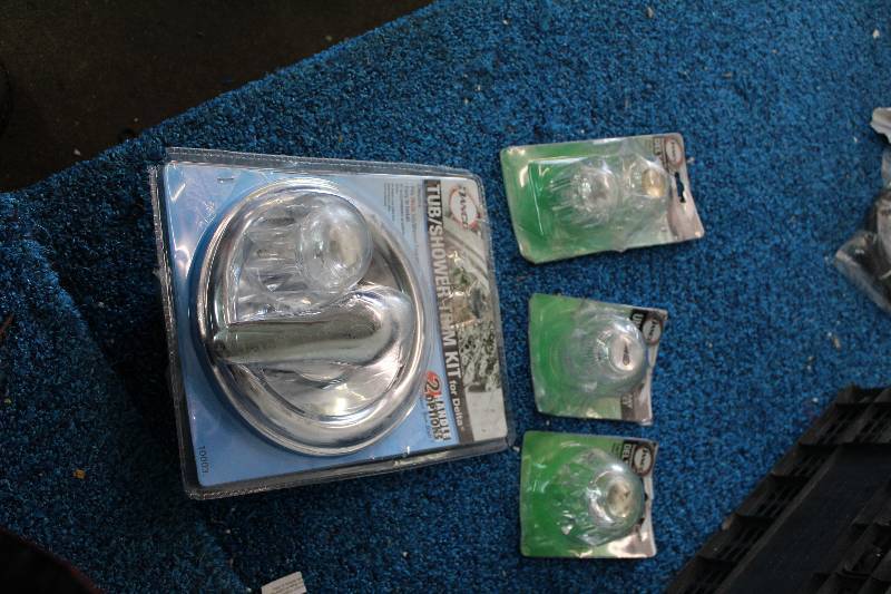 lot 69 image: Lot of (3) Danco Tub Shower Trim Ring, Danco Replacement Delta Faucet Handle, Danco Universal Facet Handle