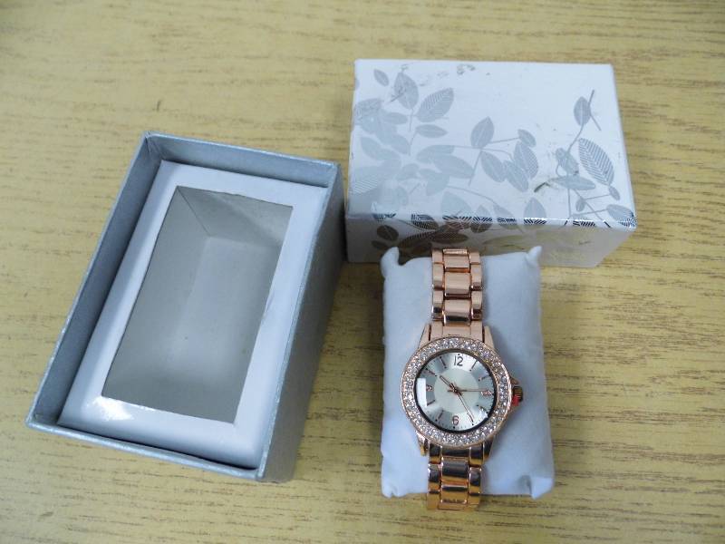 lot 105 image: Rose Gold Colored Watch