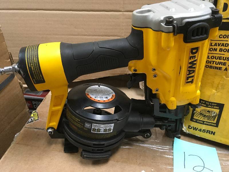 DEWALT Pneumatic 15-Degree Coil Roofing Nailer in working conditions