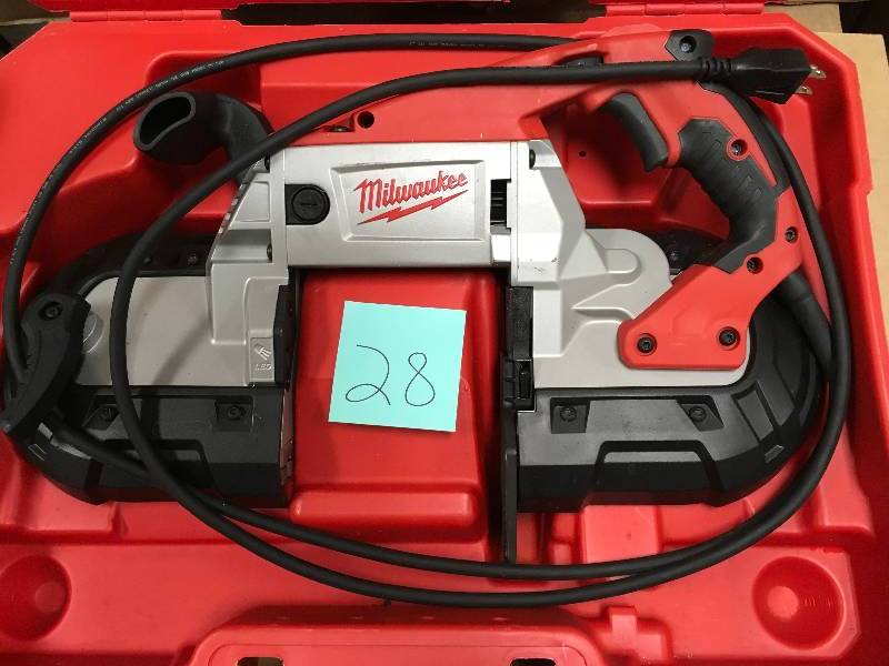 MILWAUKEE 11 Amp Deep Cut Band Saw With Hard Case in working conditions