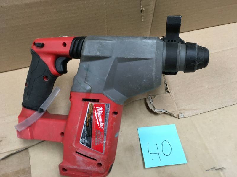 MILWAUKEE 1 in. SDS D-Handle Rotary Hammer in working conditions