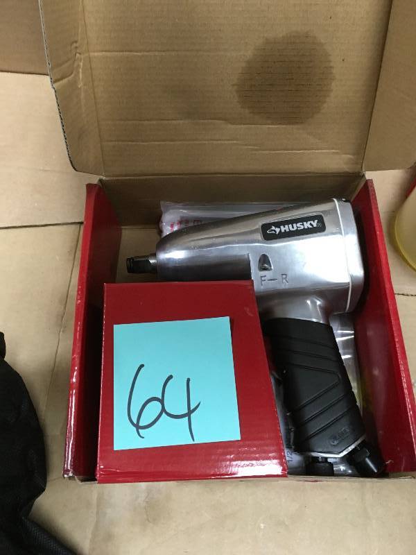 HUSKY 12 in. 300 ft. lbs. Impact Wrench in working conditions