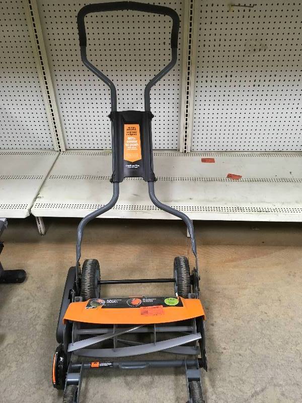 FISKARS 18 in. Cut Manual Push Non-Electric Walk Behind Reel Mower in working conditions