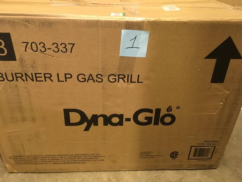 lot 1 image: DYNA-GLO 4-Burner Open Cart LP Gas Grill in Black not used