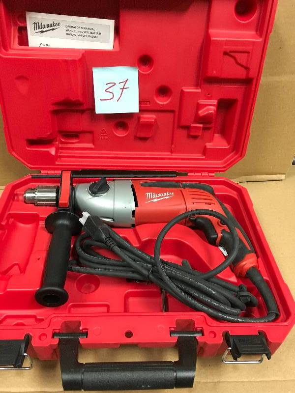 lot 37 image: Milwaukee 12 in. Heavy-Duty Hammer Drill Model#  5380-21 good working conditions