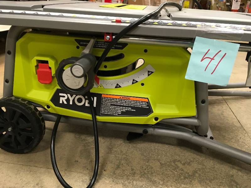 lot 41 image: RYOBI 10 in. Table Saw with Rolling Stand in working conditions