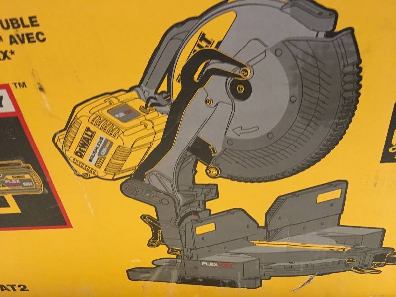 lot 49 image: DEWALT FLEXVOLT 120-Volt MAX Lithium-Ion Cordless Brushless 12 in. Miter Saw w AC Adapter, (2) Batteries 2Ah and Charger in like New working conditions