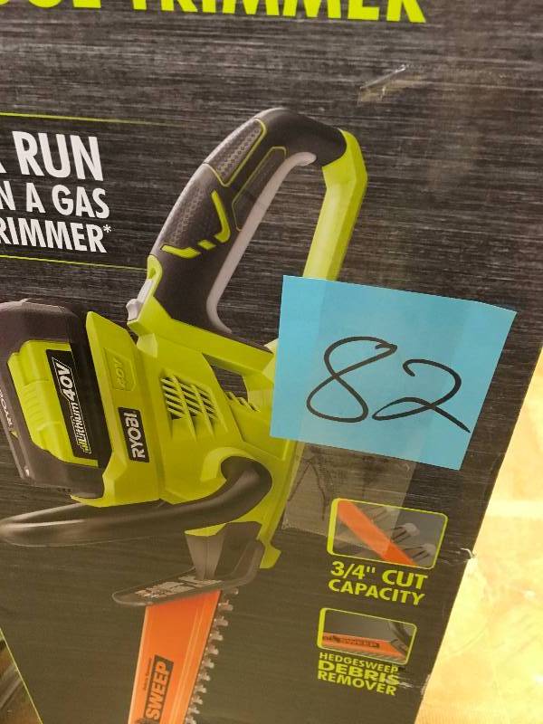 RYOBI 24 in. 40-Volt Lithium-Ion Cordless Hedge Trimmer - 2.6 Ah Battery and Charger Included in working conditions