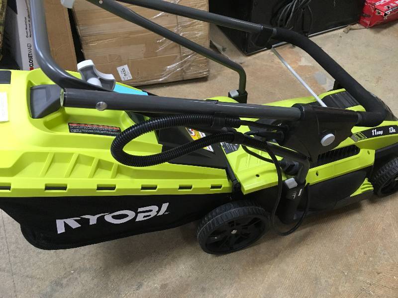 RYOBI 13 in. 11 Amp Corded Electric Walk Behind Push Mower in working conditions