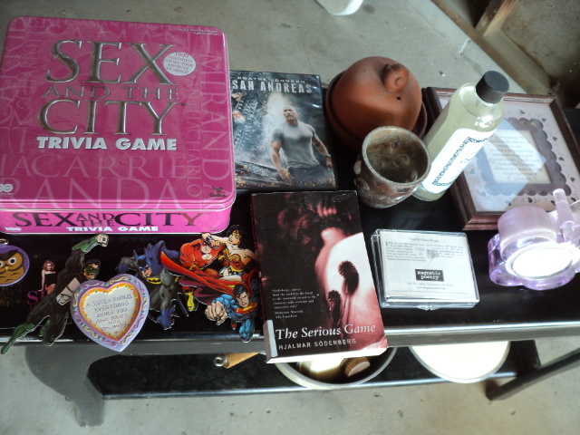 lot 9 image: Sex and the City trivia game, DVD, ...